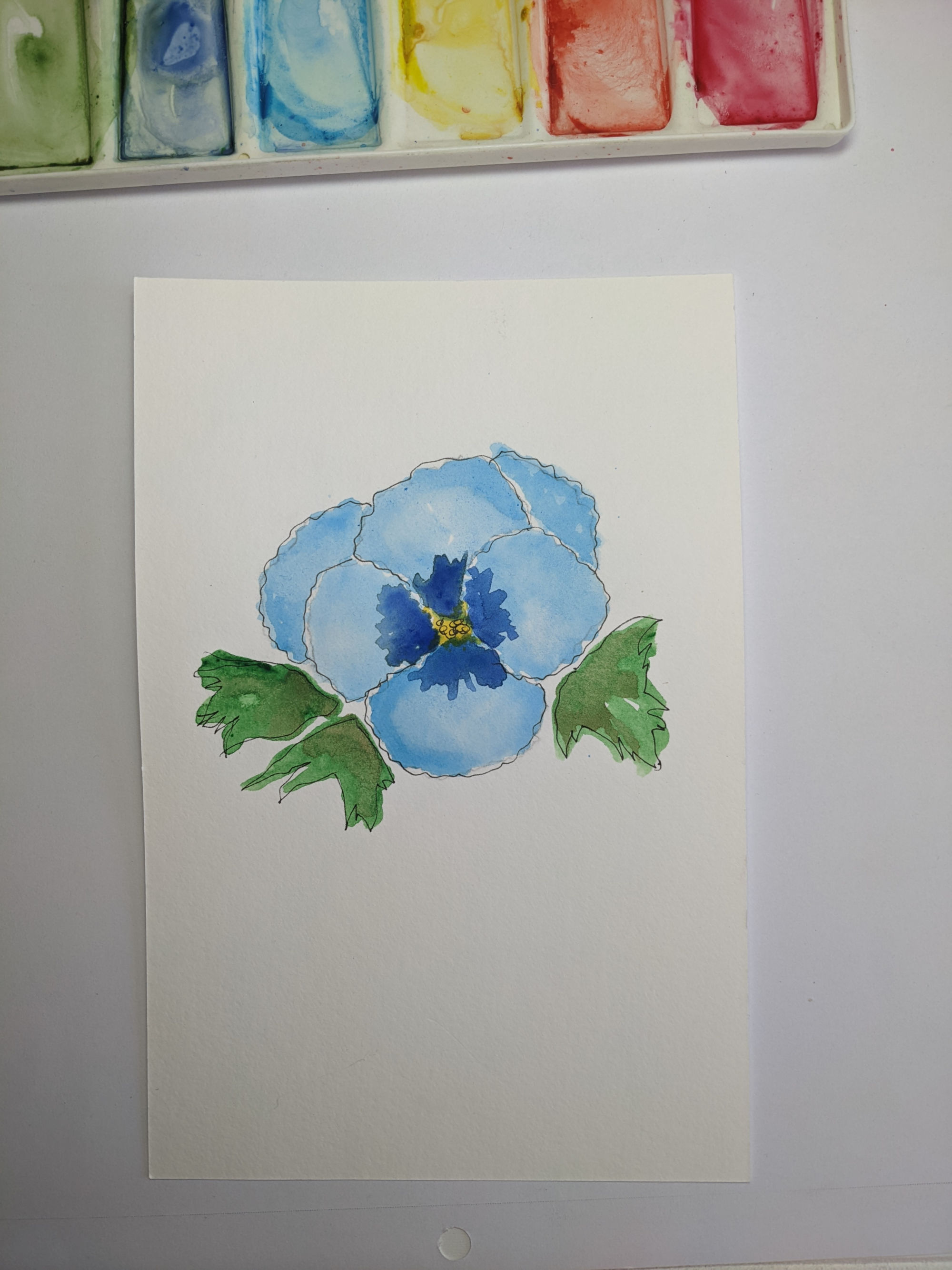 Completed watercolor & inked blue flower