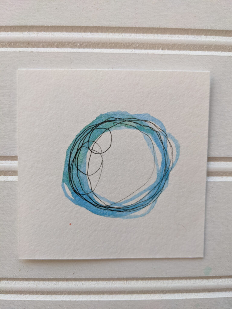 blue abstract watercolor circles with ink accents